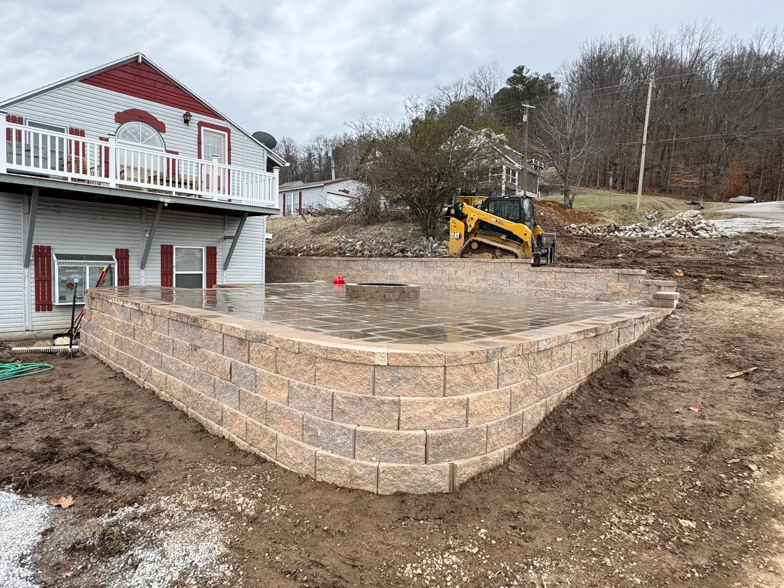 How to Choose the Best Retaining Wall Material for Your Slope (Block, Stone, and Timber Compared)